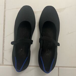 Rothy’s Black Ballet Flats with Blue Accents